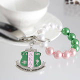 AKA Pink Green Pearl Shield Keychain | Geri's Bluffing Boutique
